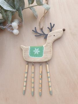 Wooden reindeer with snow flake decoration